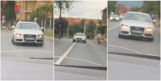Șoferul unui Audi stârnește uluire pe un drum din Negrești Oaș, în Satu Mare: "Ăsta o fumat ceva cred...uite, și cu poliția acolo! E de necrezut"