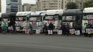 ''Stau acolo şi fac numai cancan.'' Şoferii de TIR, care au protestat pentru că statul le impozitează diurna, nu au încredere în promisiunile guvernanţilor