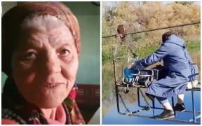Povestea bătrânei de 86 de ani care a devenit virală după ce a fost filmată traversând Mureșul pe o sârmă acționată de un scripete