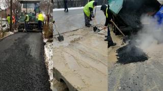 Asfaltare pe zăpadă, într-o comună din Vâlcea. Martor: "Mă interesează binele, banul cetăţeanului intră pe şanţuri"