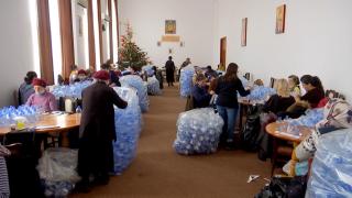 Pregătirile de Bobotează le oferă voluntarilor o lecţie nepreţuită, transmisă de la o generaţie la alta