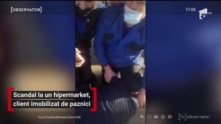 Client pus la pământ de paznicii unui supermarket, la Buzău. Oamenii au filmat incidentul, Poliţia a fost chemată