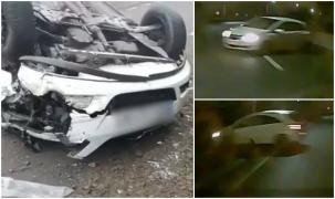 Momentul în care o maşină părăseşte şoseaua şi se răstoarnă violent, în Cluj. Două persoane au fost descarcerate