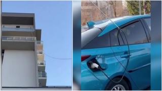 "Maaamă, mi-am revenit din moarte!" Ce soluţie a găsit un bucureştean pentru a-şi încărca maşina electrică în faţa blocului
