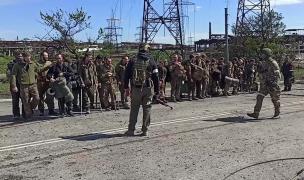 Cum sunt văzuți luptătorii din Batalionul Azov în Rusia. Un deputat îi vrea executați: "Animale îmbrăcate în haine de om"