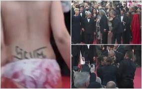 Incident pe covorul roşu de la Cannes: S-a dezbrăcat pentru a atrage atenţia asupra victimelor violurilor din război