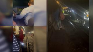 Incendiu la metrou. Pasagerii blocați urlă și intră peste mecanicul care încerca să repornească trenul: "Mai, omule, nu!". VIDEO