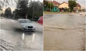 Iadul s-a dezlănţuit în Mehedinţi. Canalizările au refulat, iar zeci de maşini au rămas fără numere, după ce o vijelie a măturat tot în cale