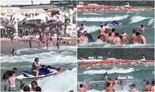 Tânără salvată în ultima clipă, la Jupiter. Momentul în care valurile uriaşe răstoarnă jet ski-ul salvamarului
