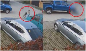 Momentul în care un copil de 6 ani sare cu bicicleta în faţa unei maşini, pe o stradă din Timişoara. Şoferul a plecat de la locul accidentului