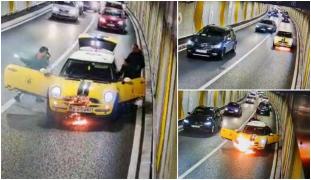 Momentul în care o mașină ia foc în Pasajul Unirii, filmat de camere. Un bebeluș a fost scos din Mini Cooper-ul cuprins de flăcări