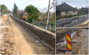 Sătenii din Hodod, izolați în propriile curți. Un zid de beton ridicat de drumari le face viața un calvar
