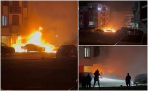 "Deschideţi uşa! Evacuaţi blocul!" BMW în flăcări, în parcarea unui bloc din Mamaia Nord. Mașina a ars în totalitate