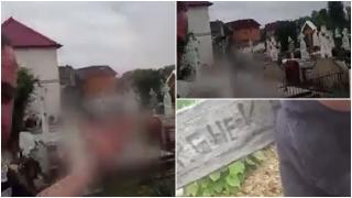 Ameninţată live din cimitir. Un bărbat s-a filmat lângă mormântul tatălui său şi i-a promis fostei soţii că acolo va ajunge şi ea: "Fii atentă ce spun eu!"