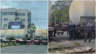 Testul răbdării pe calea ferată de pe şoseaua Petricani. Marfar rămas blocat pe şine, oamenii au făcut slalom printre vagoane. "Trec pe răspunderea mea"