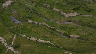 "Muncim cu sapa pe unde putem". Imaginea dezolantă lasată în urmă de carierele de cărbune: terenurile agricole din Gorj arată ca după bombardament