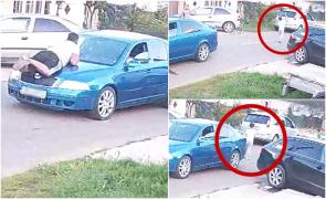 Momentul teribil în care un copil de 10 ani este lovit de maşină, în faţa casei, după o glumă bizară. Imaginile şocante, surprinse de camere