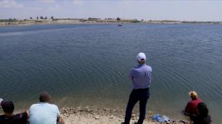 Cei doi prieteni căutați de aproape 20 de ore în râul Olt au strigat după ajutor înainte să dispară sub apă. Filmul tragediei din Giuvăreşti