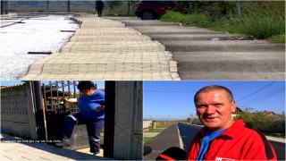 Cum arată strada în zig-zag dintr-o localitate din Gorj. Localnicii construiesc rampe ca să poată ieşi din curţi