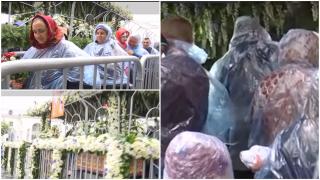 Râuri de oameni la pelerinajul Sfintei Parascheva de la Iaşi. Credincioşii îndură ploaia şi frigul pentru a ajunge la racla cu moaşte