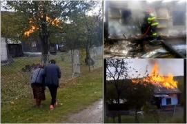 Bătrânică de 92 de ani, salvată în ultima clipă din calea focului. Din cauza coşului de fum, gospodăria i-a fost cuprinsă de flăcări, în Suceava