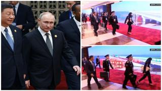 Imagini rare cu Vladimir Putin însoţit de ofiţeri cu servieta nucleară, în China. A ieşit zâmbind de la negocierile cu Xi