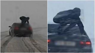 Şoferul unui BMW și-a cocoțat prietenul pe portbagaj ca să aibă mai multă aderență pe șosea. Imaginile virale filmate pe un drum înzăpezit din Vaslui