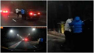 Momentul în care o mașină de poliție trece cu nepăsare pe lângă o bătaie. Un șofer de ridesharing și 2 clienți, lăsați să-și împartă pumni în voie