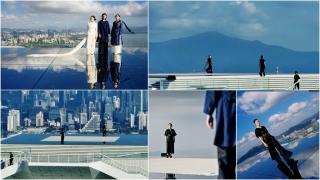 Prezentare de modă la înălțime. Zeci de modele au defilat pe acoperișul unui zgârie-nori din China, în fața a peste 40 de diplomaţi