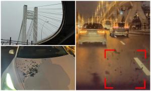 Momentul în care o bucată de tencuială se desprinde de pe Podul Basarab şi cade pe o maşină în mers. Şoferul va plăti singur reparaţiile