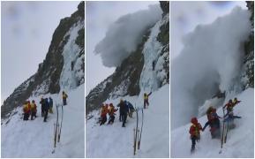 Momentul în care mai mulţi salvamontişti sunt surprinşi de o avalanşă, în Munţii Tatra din Slovacia. Grupul se pregătea să urce pe o cascadă înghețată