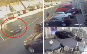 Momentul în care un şofer demarează brusc din parcare şi intră cu BMW-ul prin uşa unui restaurant, la Băile Herculane