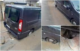 Maşini înghiţite de asfalt pe o stradă în Constanţa, după o lucrare de înlocuire de ţevi. "M-am trezit că mă afund"