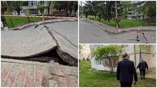 Imagini apocaliptice în Slănic: o stradă s-a surpat lângă blocuri, zeci de familii evacuate. Raed Arafat a trimis experți cu elicopterul