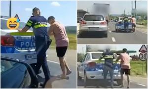 Poliţist filmat cum împinge maşina de serviciu, pe un drum din Mehedinţi. Un alt şofer i-a dat o mână de ajutor