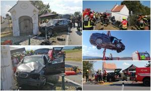 Accident mortal cu români, în Austria. Trei tineri s-au înfipt cu BMW-ul într-o capelă, un băiat de 17 ani a sfârșit pe loc