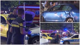 Maşină de Poliţie în misiune, izbită pe Bd. Magheru din Capitală de un şofer grăbit. Autospeciala, proiectată în doi pietoni pe trecere şi un taxi aflat la semafor