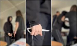 Elev de clasa VI-a cu o foarfecă în mână, surprins cum ameninţă o colegă în clasă. Imaginile, filmate într-o şcoală din Timiş