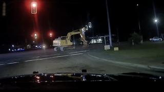Un american a furat un excavator şi a încercat să 