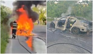 O maşină a luat foc în mers, în Argeş. Şoferul şi un alt pasager s-au salvat în ultima clipă