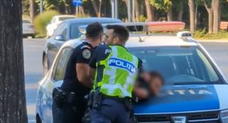 Scandal cu pumni în faţa unui magazin din Constanţa. Bărbat încătuşat, după ce a devenit recalcitrant