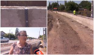 O comună s-a trezit cu maşinile blocate în curţi. Şoseaua, înălţată cu 80 de cm