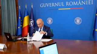 Bolojan interzice cumulul pensie-salariu: dacă te-ai pensionat la 50 de ani, îţi găsesti de muncă la privat