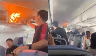 Momentul în care o baterie de litiu ia foc în compartimentul de bagaje al unui avion Air China. Zborul, deviat