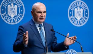 Bolojan discută, astăzi, cu sindicatele și patronatele despre salariul minim în 2026