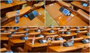 Mizerie și cartele uitate în console după o noapte albă în Parlament. Amendamente controversate, adoptate