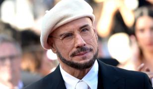 Moment special la Cannes. John Travolta a primit Palme d'Or onorific pentru întreaga carieră