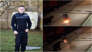 Momentul în care un pompier aflat în timpul liber stinge un lampion căzut în flăcări pe un cort de nuntă