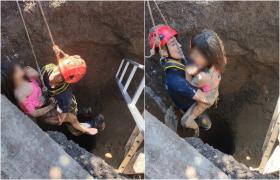 Momentul în care fetiţa de 8 ani din Vrancea este scoasă din fântână de pompieri