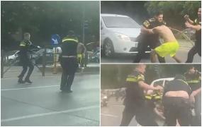 EXCLUSIV. Noi imagini cu intervenţia comică a celor 5 poliţişti cu bărbatul în şort, filmate de un şofer
